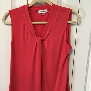 Coral Calvin Klein sleeveless top.